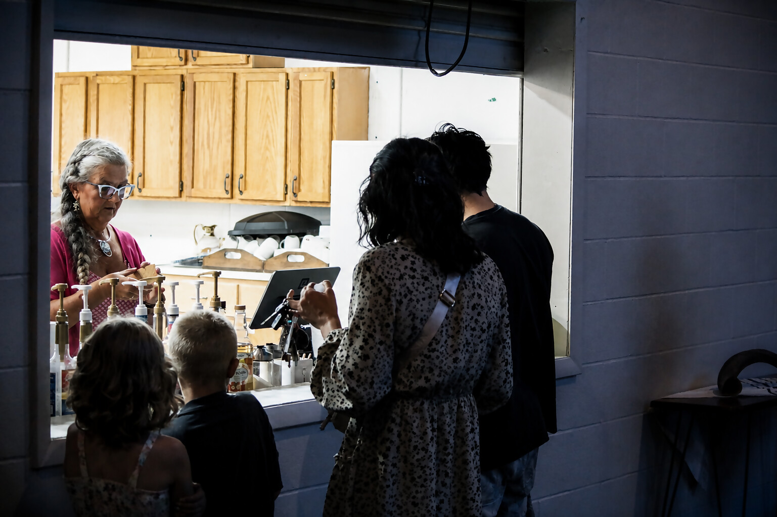 A warm embrace during prayer at the front of the sanctuary